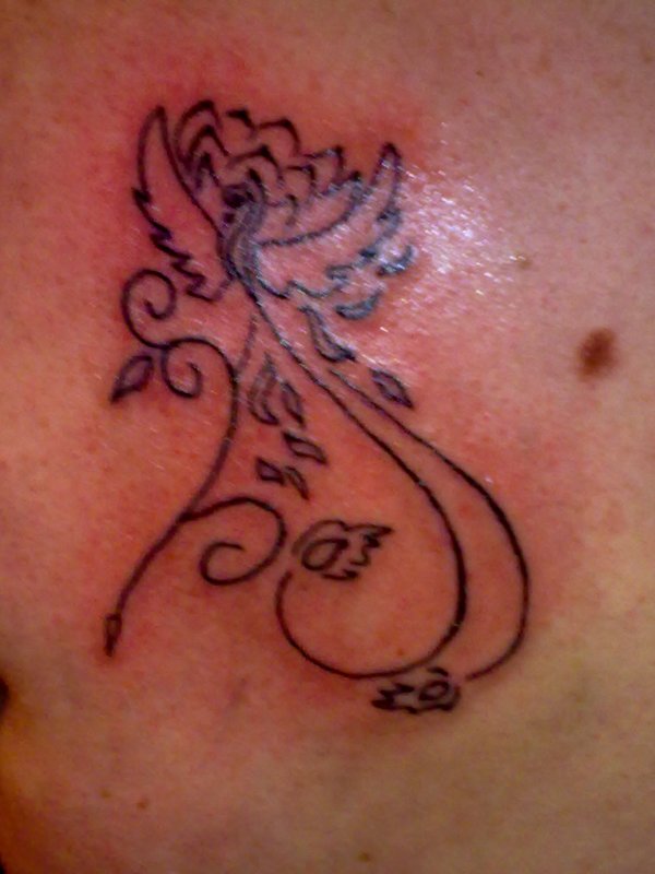 Real community tattoo placement: Evil Zone - Phoenix and lotus: inked placement tattoo photo