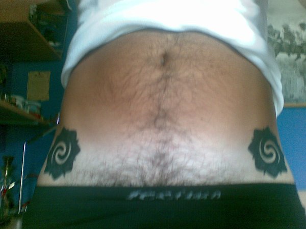 Real community tattoo placement: Mirko - Borneo rosettes: inked placement tattoo photo