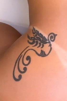 Paloma Fernandes swallow closeup - inked tattoo close-up detail