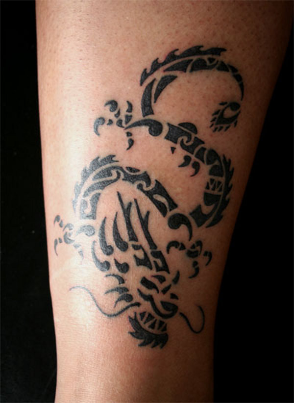Real community tattoo placement: Shivani - Polynesian dragon: inked placement tattoo photo