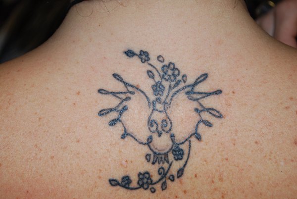 Real community tattoo placement: Tiziana - Owl and cherry blossoms: inked placement real user tattoo photo