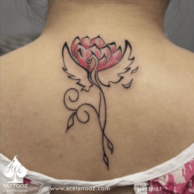 Phoenix and lotus tattoo on the upper back: inked placement tattoo photo