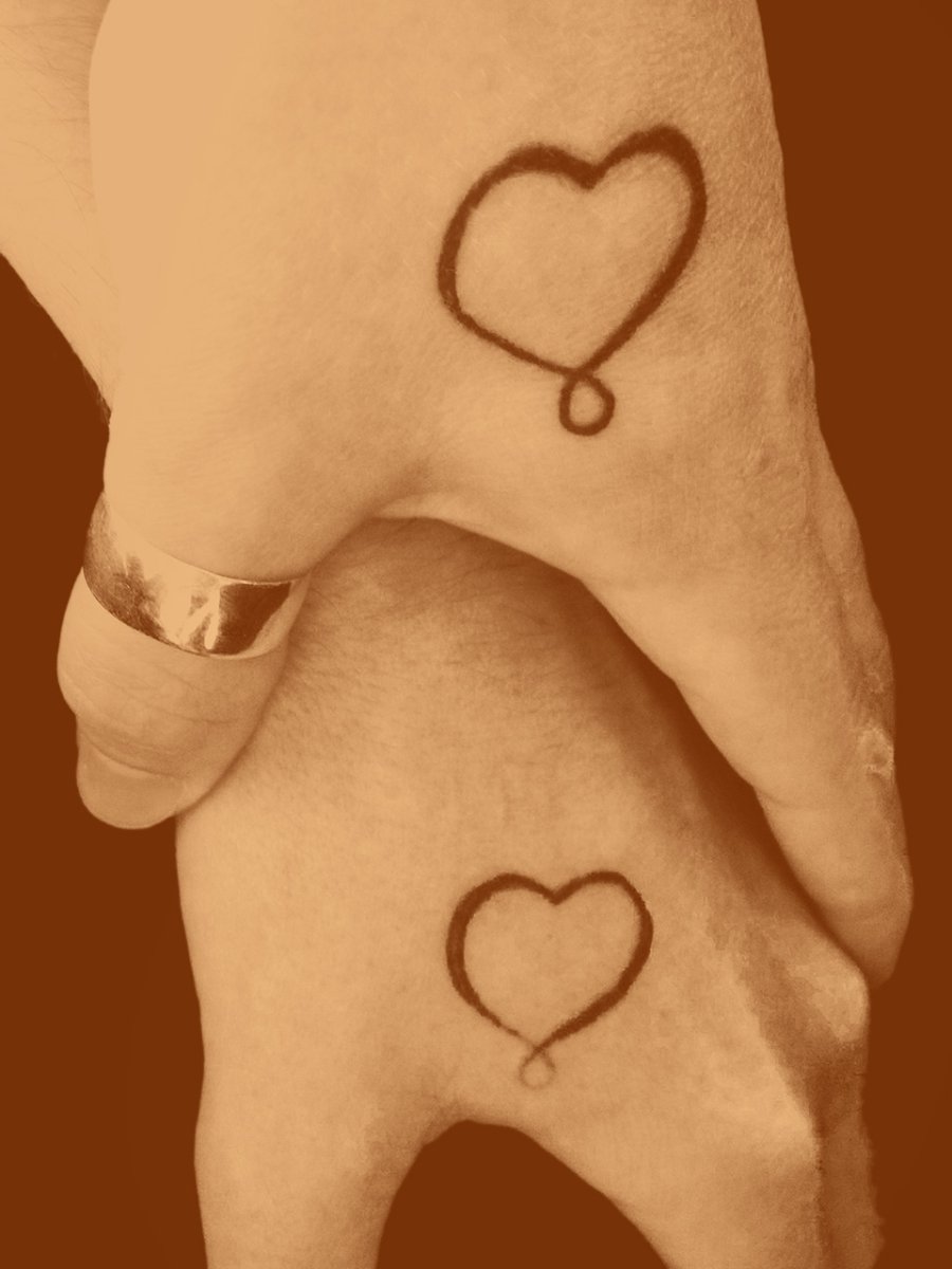 Guest photo of infinity heart tattoo used as couples tattoo: inked placement tattoo photo