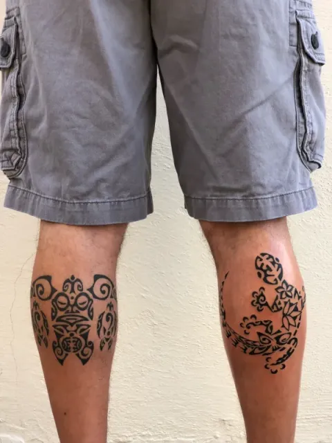 Adam - calf tattoos