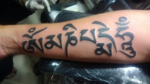 Agus - Tibetan Om Mani Padme Hum: real inked placement tattoo photo thumbnail