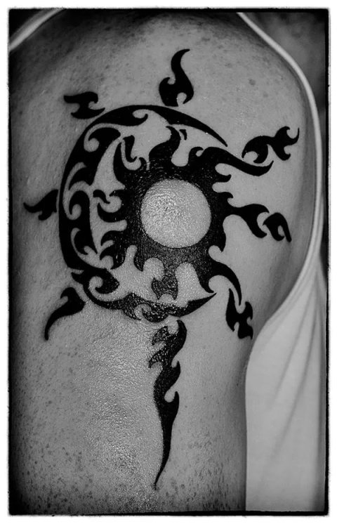 Alessio - Tribal sun moon: real inked placement tattoo photo thumbnail