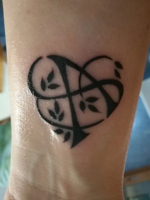 Ariadna - A heart: real inked placement tattoo photo thumbnail