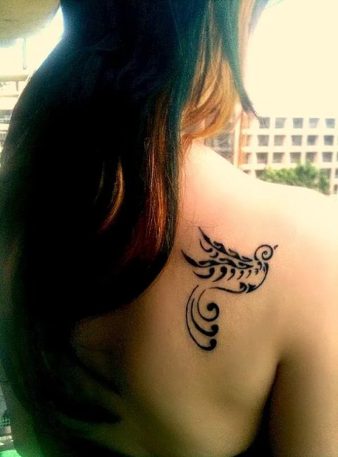 Ariana - swallow: real inked placement tattoo photo thumbnail