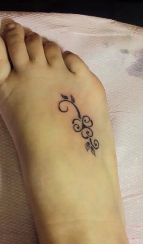 Autumn - Triskell clover: real inked placement tattoo photo thumbnail