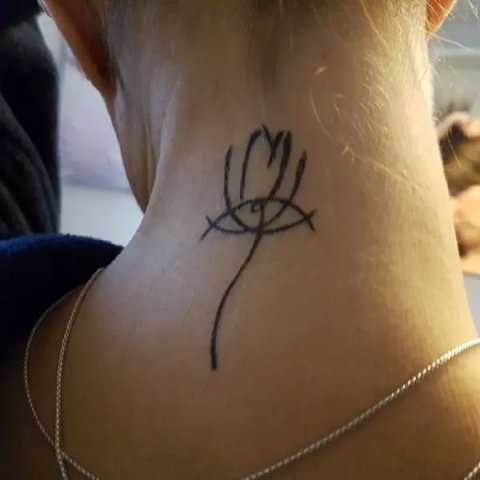 Barbara - Minimal lotus: real inked placement tattoo photo thumbnail