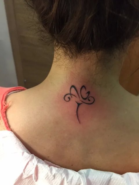Barbara - Lotus A+G: real inked placement tattoo photo thumbnail