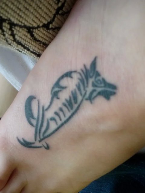 Bodil - Wolf and gladiolus: real inked placement tattoo photo thumbnail