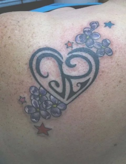 Charmaine - Heart and flowers: real inked placement tattoo photo thumbnail