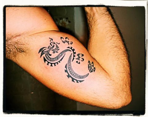Chris - Maori style dragon: real inked placement tattoo photo thumbnail