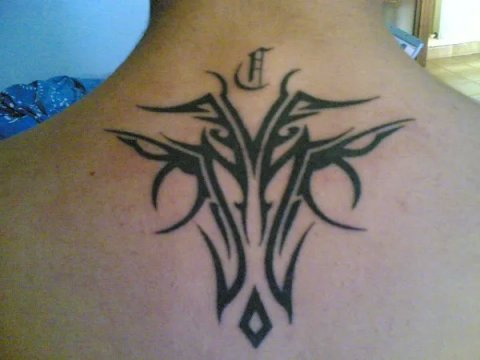 Christian - Tribal: real inked placement tattoo photo thumbnail