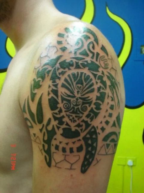 Christos - Marangai: real inked placement tattoo photo thumbnail