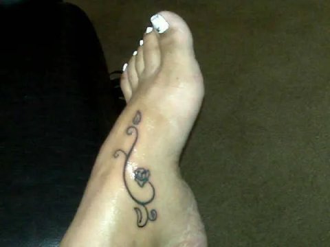 Desiree - Thornless rose: real inked placement tattoo photo thumbnail