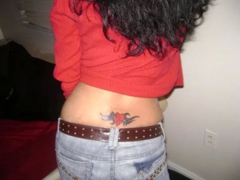 Dorothy - Tribal heart: real inked placement tattoo photo thumbnail