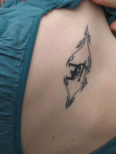 Eleonora - Tribal with letters: real inked placement tattoo photo thumbnail