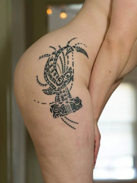 Evey - Riunga tattoo photo: real inked placement tattoo photo thumbnail