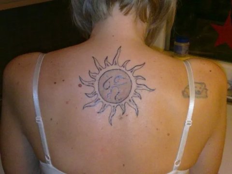 Evil Zone - Sun and zodiac signs: real inked placement tattoo photo thumbnail