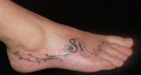 Evil Zone - Tribal lettering: real inked placement tattoo photo thumbnail