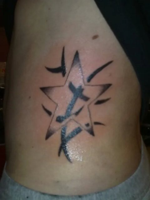 Evilzone - Tribal star: real inked placement tattoo photo thumbnail