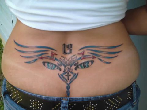 Felicia - winged lowerback: real inked placement tattoo photo thumbnail