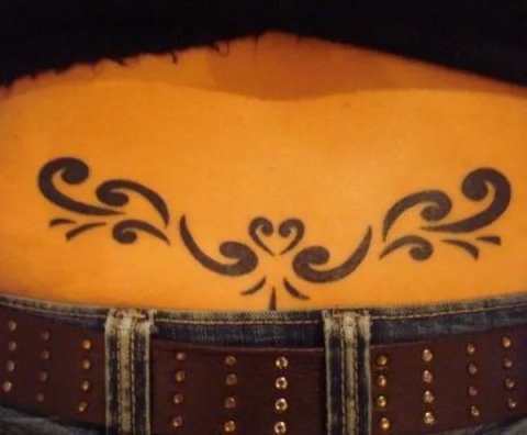 Gabi - Koru lowerback: real inked placement tattoo photo thumbnail