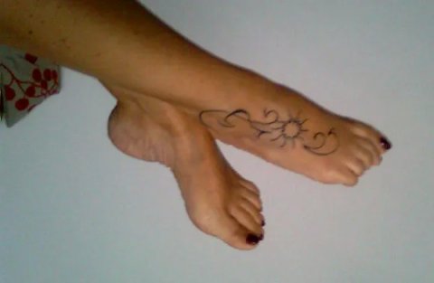 Giorgia - Sun waves: real inked placement tattoo photo thumbnail