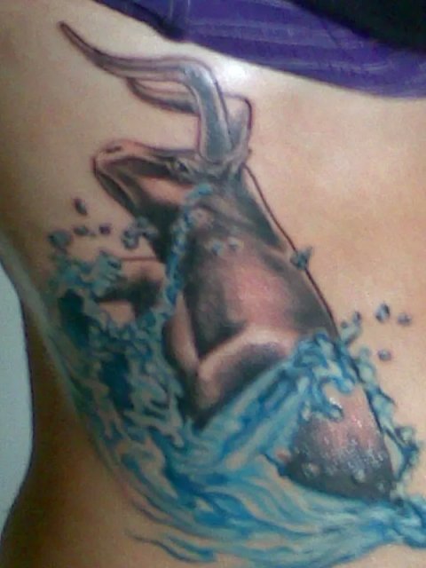 Giulia - Bull and water: real inked placement tattoo photo thumbnail