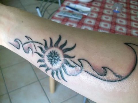 Giuseppe - Sun, wind, waves: real inked placement tattoo photo thumbnail