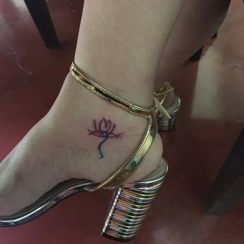 Gracia - M lotus: real inked placement tattoo photo thumbnail