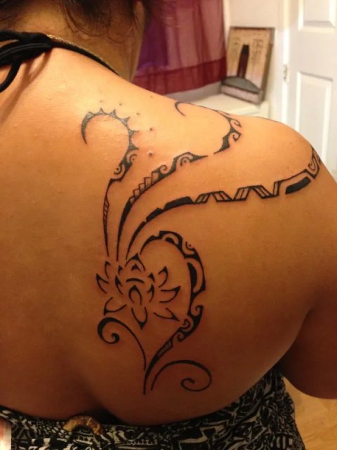 Guest - Lotus Polynesian: real inked placement tattoo photo thumbnail