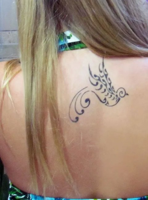 Guest - Swallow: real inked placement tattoo photo thumbnail