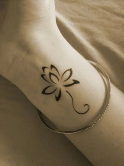 Guest's photo of the Lotus flower, Lotus flower, Overcoming all difficulties tattoo: real inked placement tattoo photo thumbnail