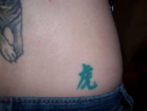 Jenna - dragon kanji: real inked placement tattoo photo thumbnail