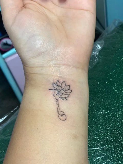 Juanita - lotus hummingbird: real inked placement tattoo photo thumbnail