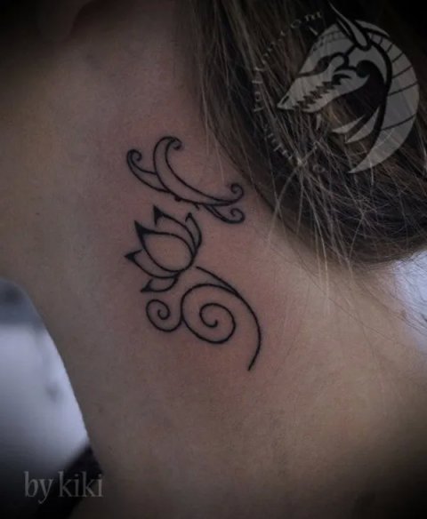 Kristina - Lotus and butterfly: real inked placement tattoo photo thumbnail