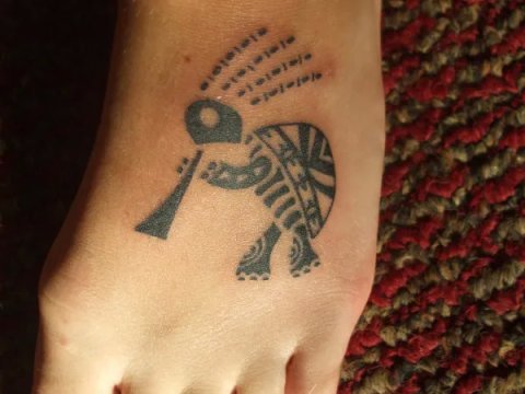 Kylie - kokopelli turtle: real inked placement tattoo photo thumbnail