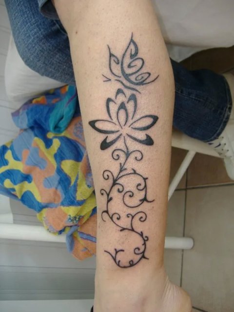 Ladybrain - Lotus and butterfly: real inked placement tattoo photo thumbnail