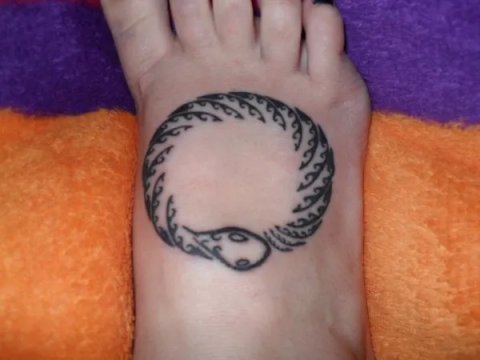 Maurina - Ouroboros: real inked placement tattoo photo thumbnail