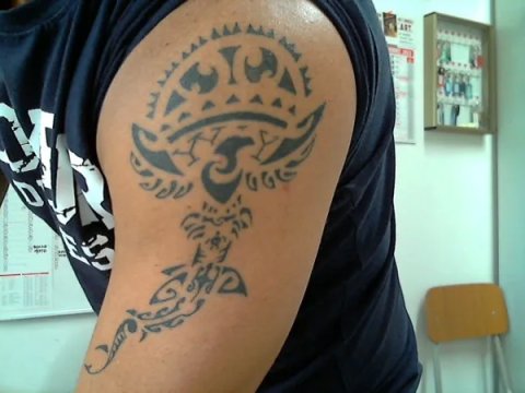 Maurizio - Polynesian mix: real inked placement tattoo photo thumbnail