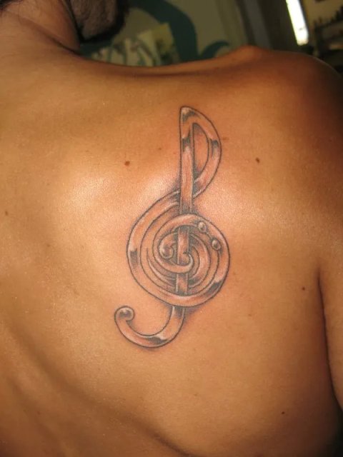 Nunzio - Musical clefs: real inked placement tattoo photo thumbnail