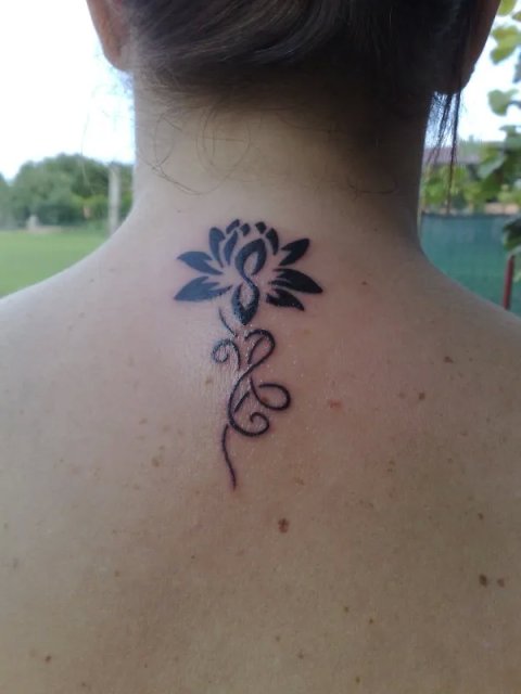 Ombretta - Lotus flower: real inked placement tattoo photo thumbnail