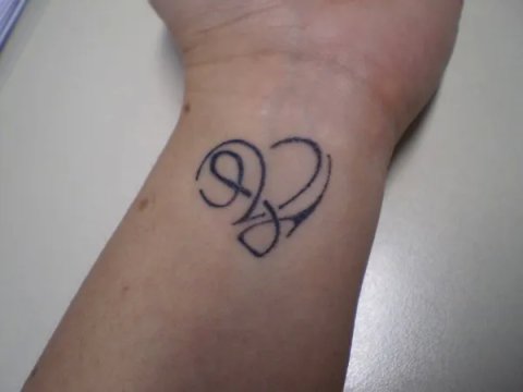Pam - L+V heart: real inked placement tattoo photo thumbnail