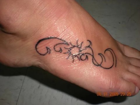 Rachel - Sun & waves: real inked placement tattoo photo thumbnail