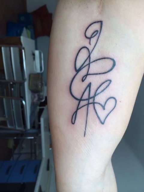 Romina - J+C+A: real inked placement tattoo photo thumbnail