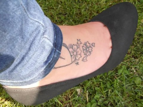 Sara - Heart + cherry blossoms: real inked placement tattoo photo thumbnail