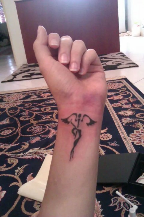 Sara - cosmetic: real inked placement tattoo photo thumbnail